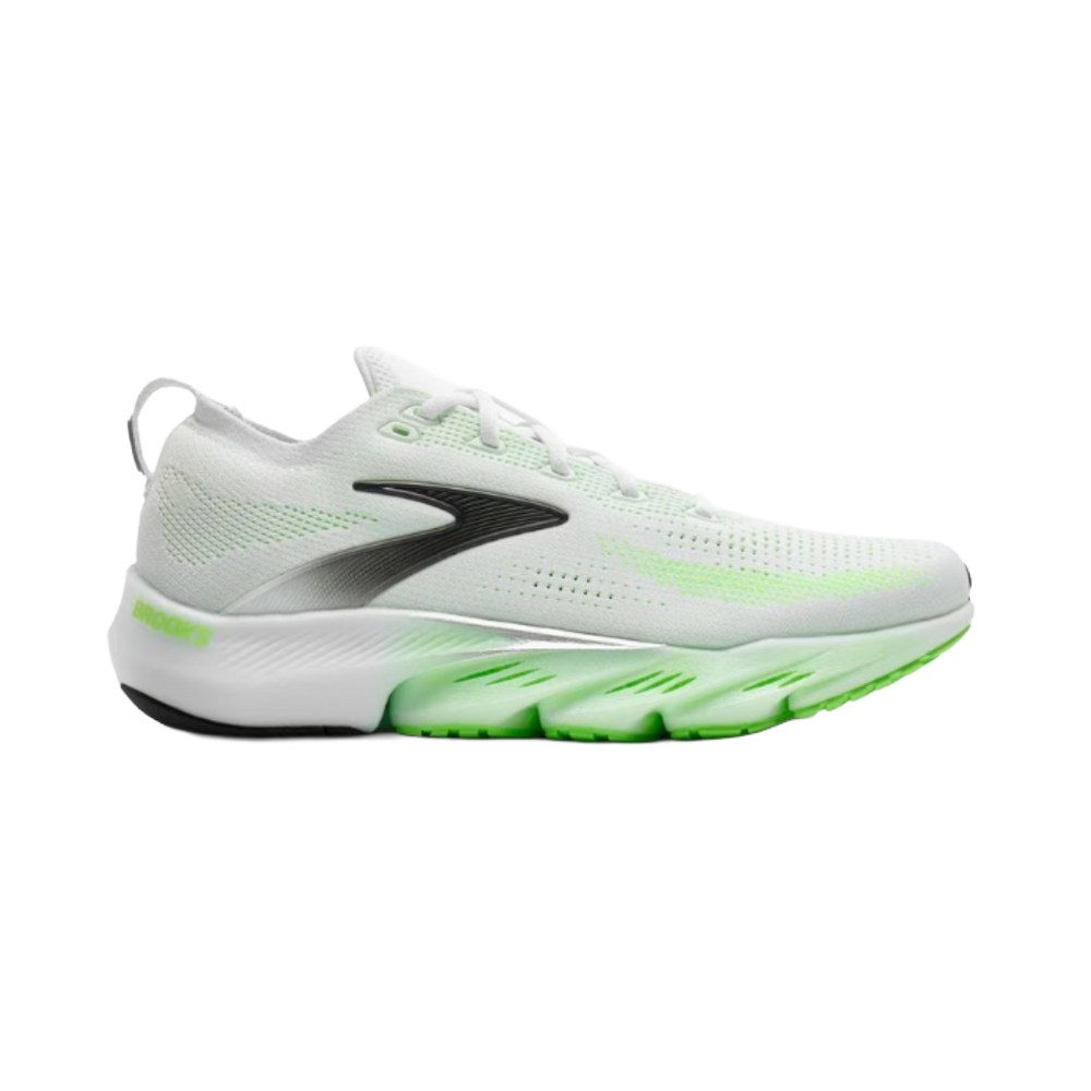 White running shoe with green accents on a white background